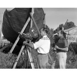 ABC cameraman filming boat building